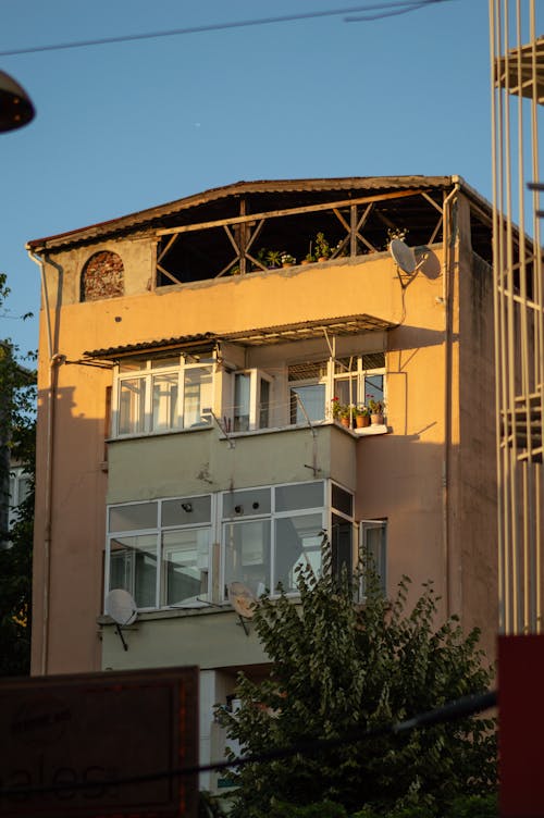 Residential Building with Balconies against Blue Sky