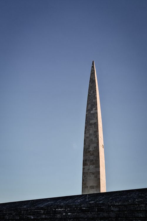 Free A striking view of the Tsitsernakaberd Memorial Obelisk against a clear sky in Yerevan, Armenia. Stock Photo