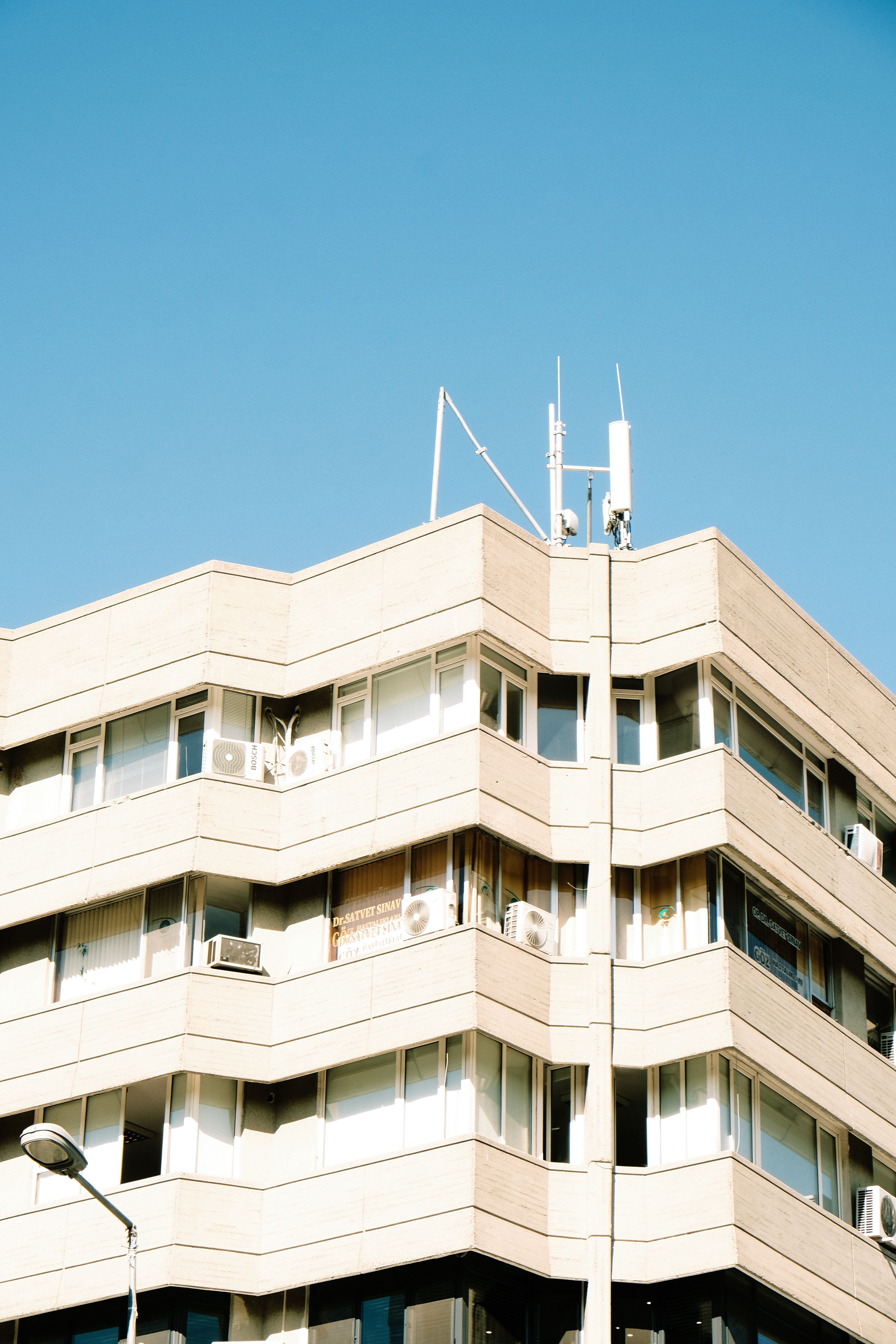 Residential Building against Blue Sky · Free Stock Photo