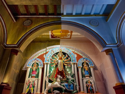 Sculptures inside the 66 Pally Durga Puja Pandal Temple