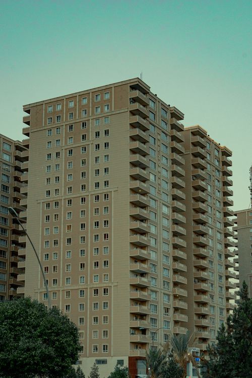 Free Tall modern apartment buildings in an urban setting during the day. Stock Photo