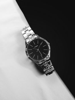 Timex watch showcasing elegance and precision with a classic black and white aesthetic.