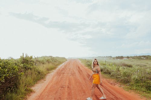 Blonde Woman Posing on Dirt Road