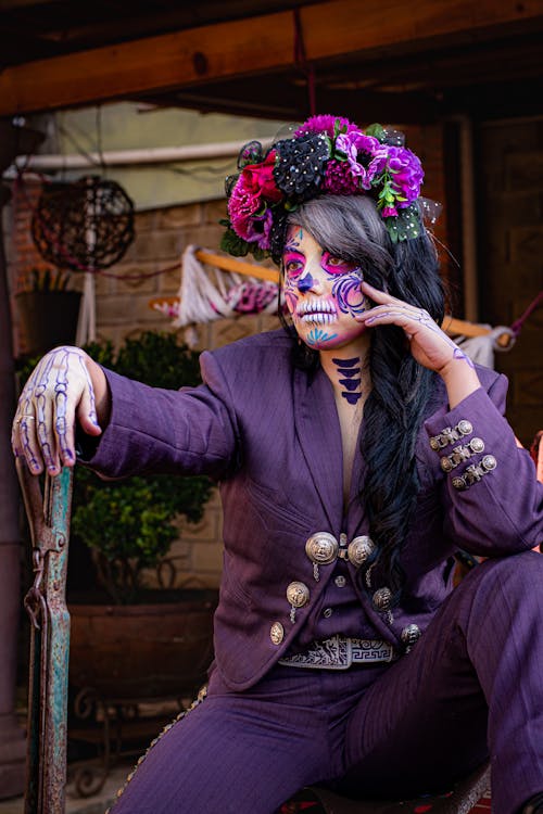 Woman as Catrina in Purple Suit