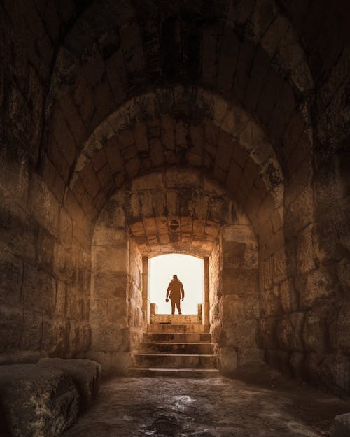 Free Silhouette of Person Seen Through the Tunnel Stock Photo