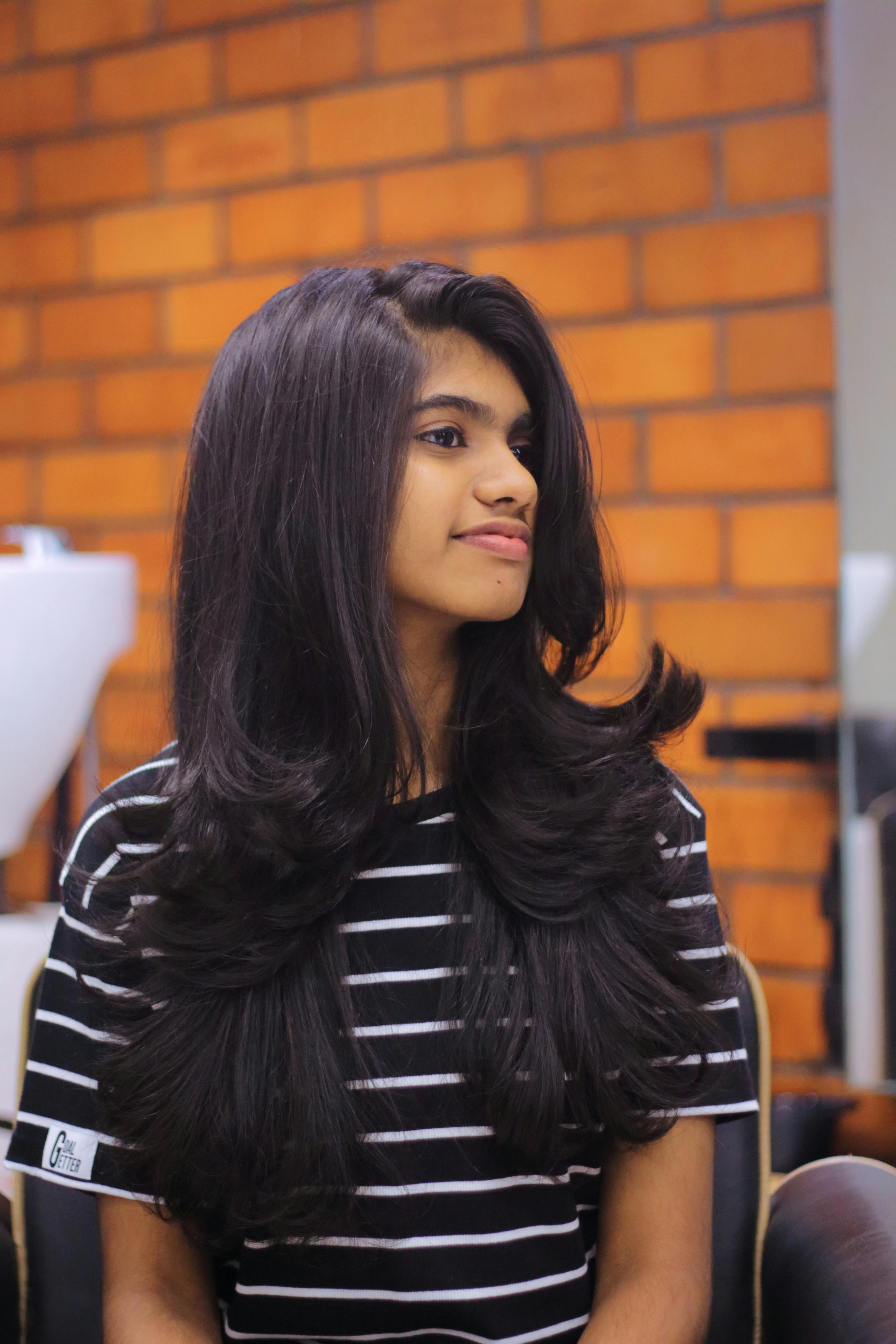 Indian woman with glossy styled hair