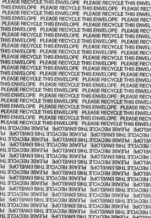Close-up of Lines of Text Saying "Please Recycle This Envelope"