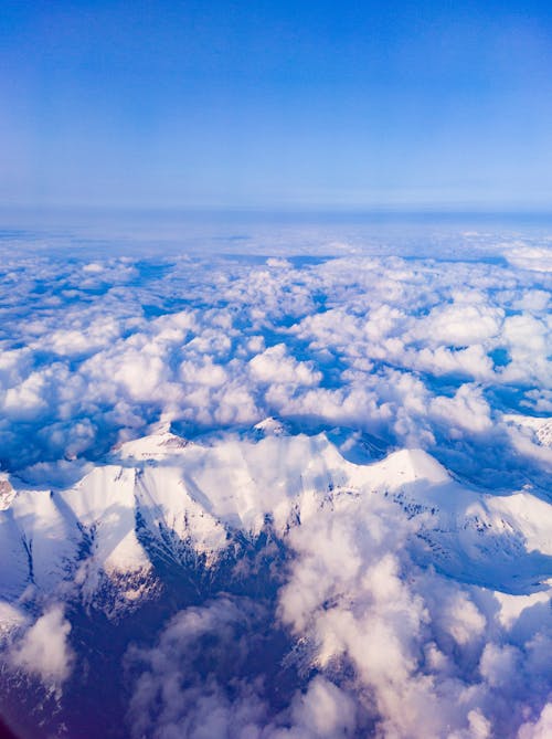 Foto profissional grátis de acima das nuvens, céu azul, fotografia aérea