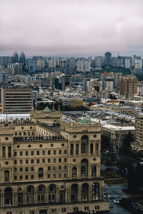 Free A panoramic cityscape of Baku with notable architecture and skyline at dusk. Stock Photo