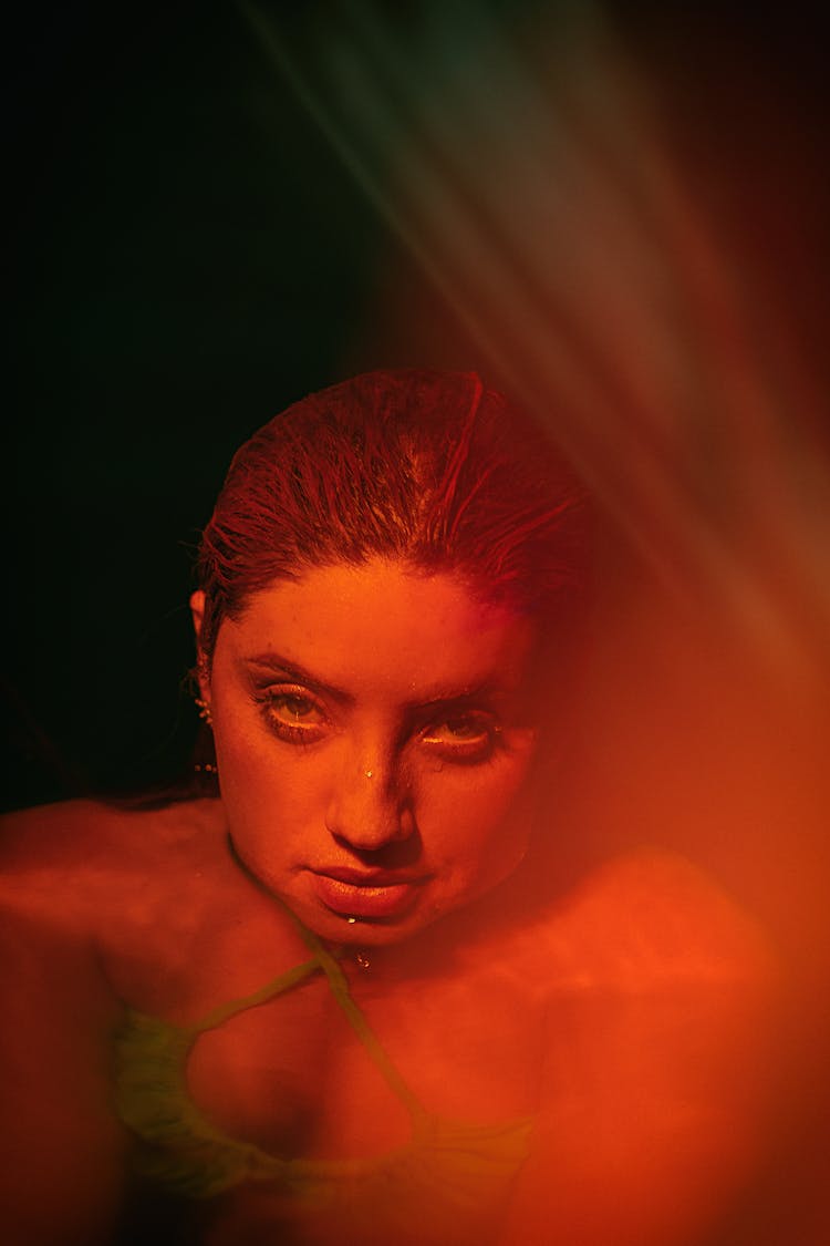 Portrait Of Woman In Red Light