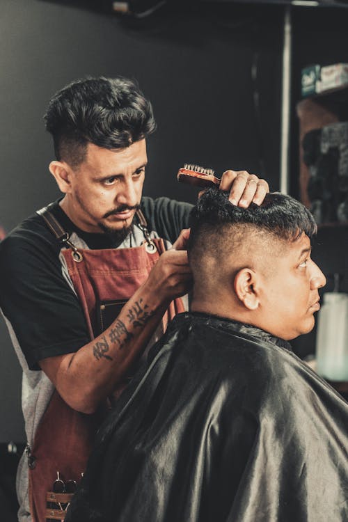Barber Cutting Man's Hair