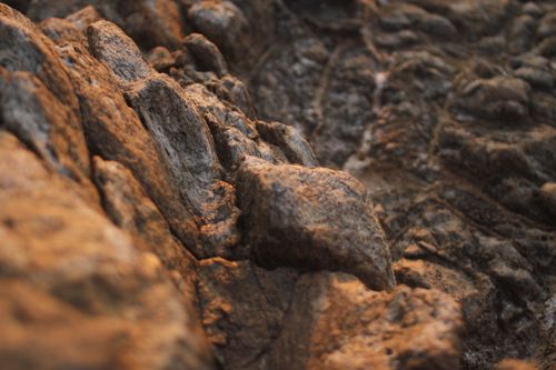 Free Close-up of a rugged rock formation showcasing natural erosion patterns in Salvador, Brazil. Stock Photo