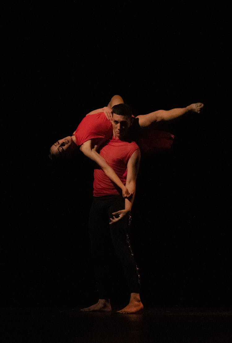 Man And Woman Dancing On Stage