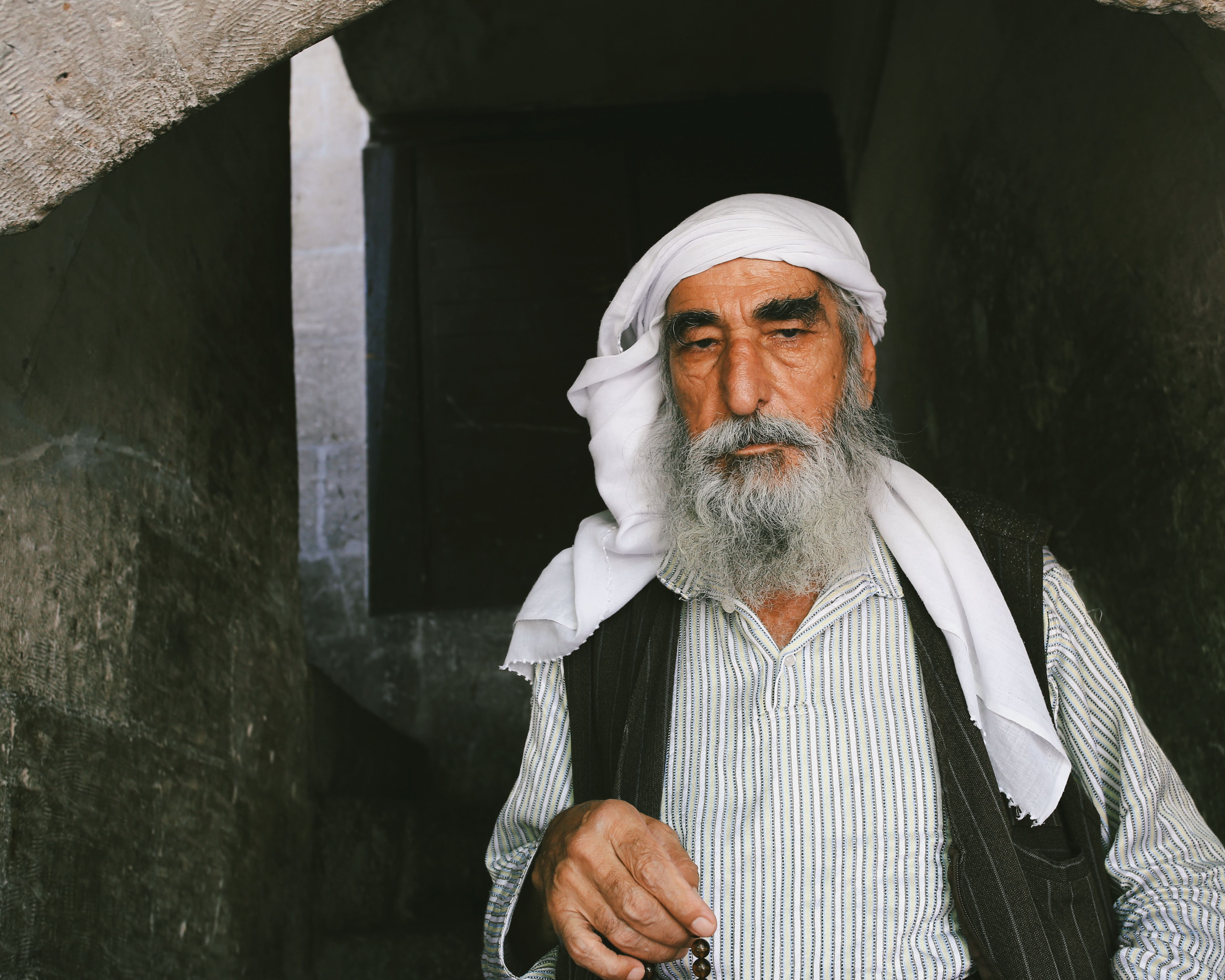 Bearded Man in a Turban Holding Prayer Beads · Free Stock Photo