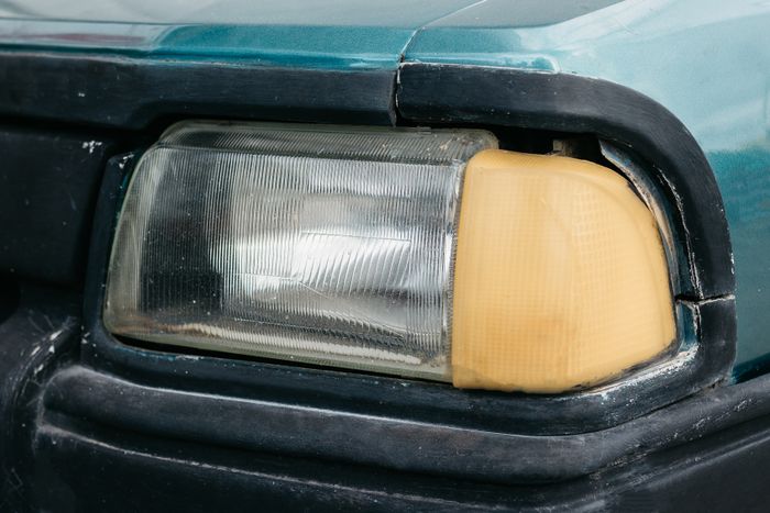 Before — hazy, oxidised headlight lens with reduced clarity