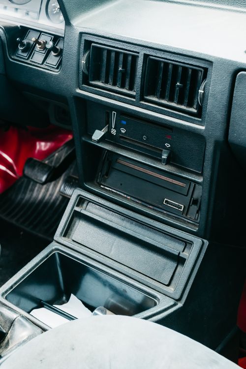 Free Explore a classic vintage car interior showcasing retro dashboard controls and design. Stock Photo