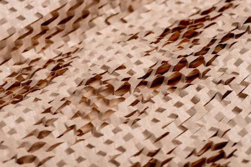 Brown Paper Cut into Intricate Pattern