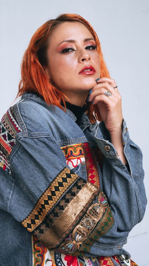 Young Woman Wearing a Patterned Denim Jacket 