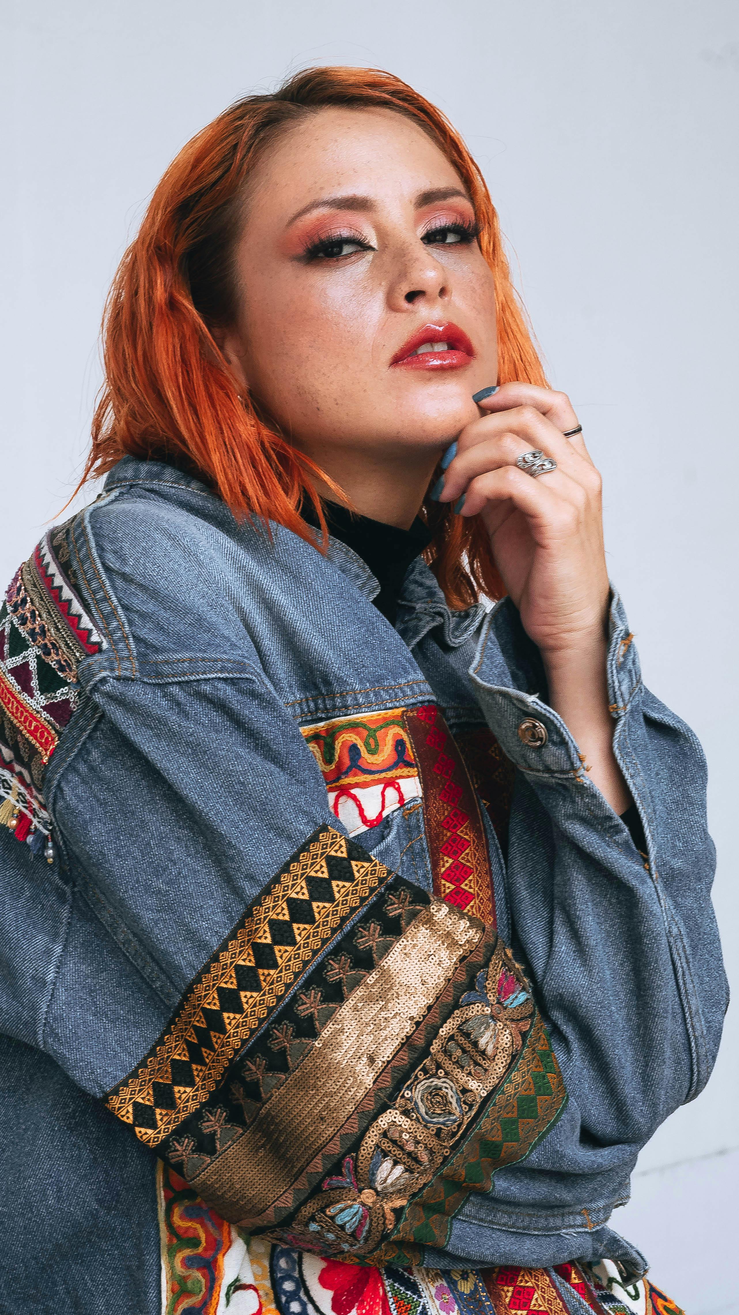 Young Woman Wearing a Patterned Denim Jacket · Free Stock Photo
