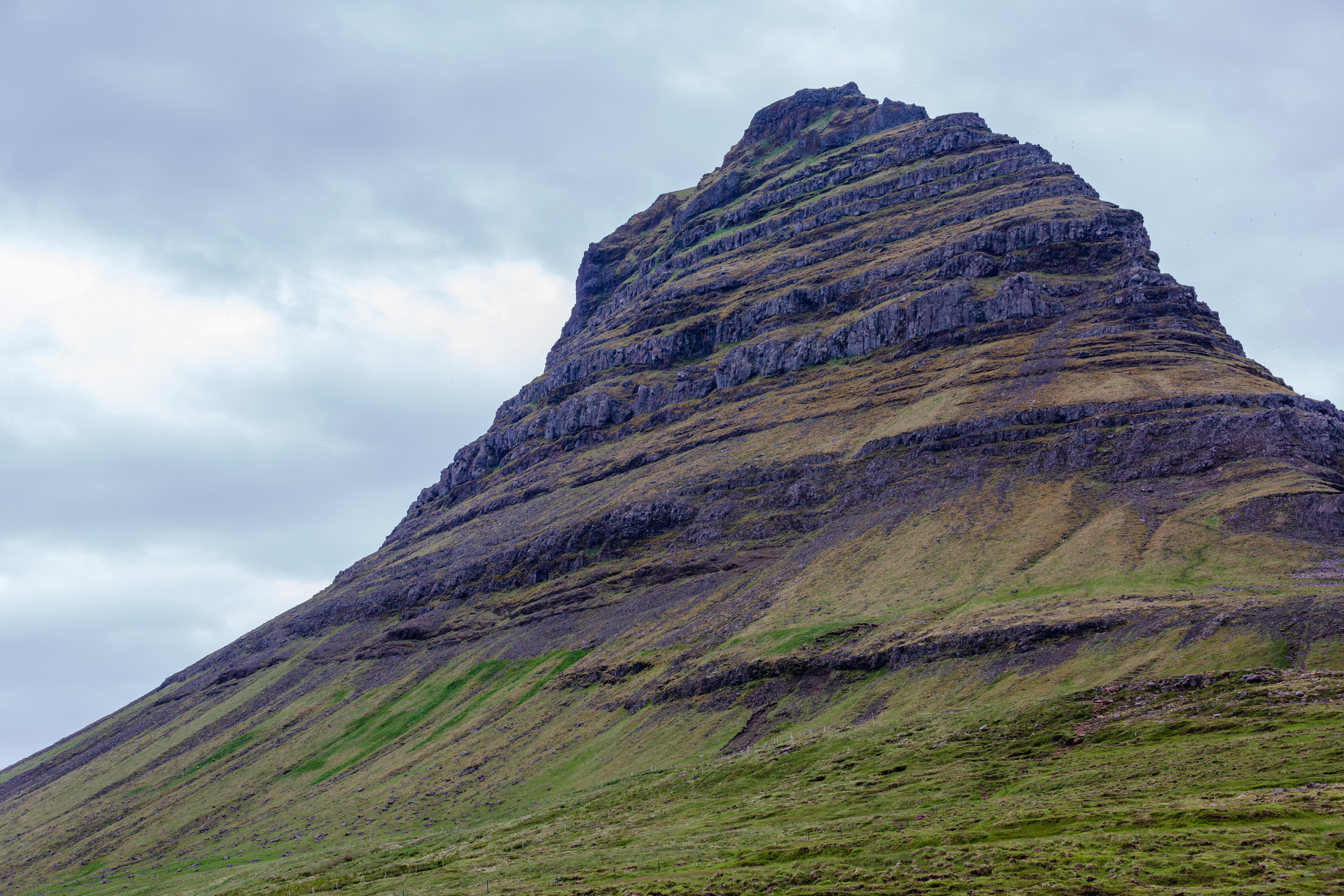 A mountain with a large rock on top · Free Stock Photo