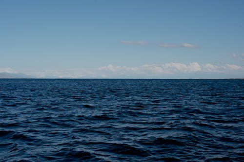 Kostnadsfri bild av blå himmel, blått vatten, hav