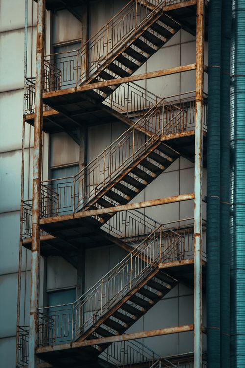Free Rugged fire escape stairs on an industrial building in Baku, Azerbaijan. Stock Photo