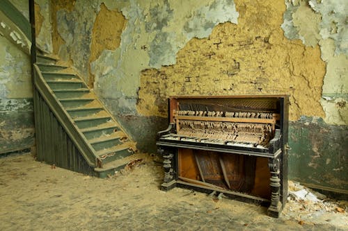 Broken Piano in an Abandoned Building