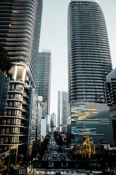 High-rise buildings in a bustling city downtown with modern architecture.