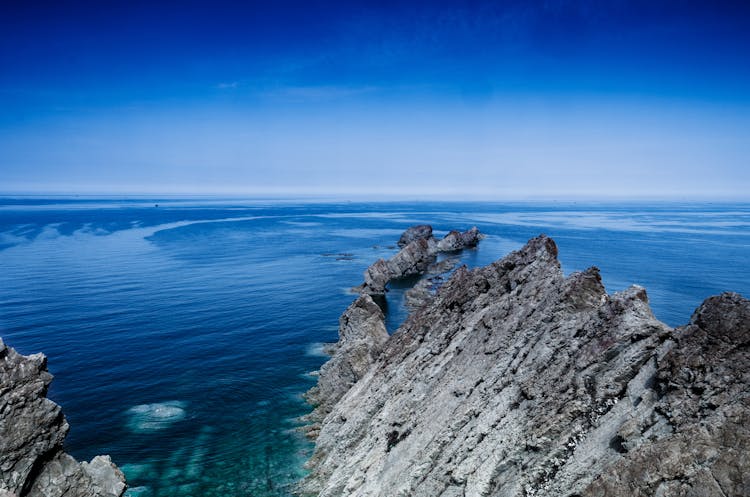 Barren Rocks On Sea Shore