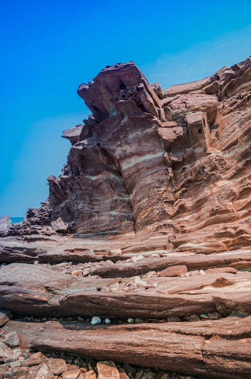 Low Angle Shot of a Sandstone Cliff