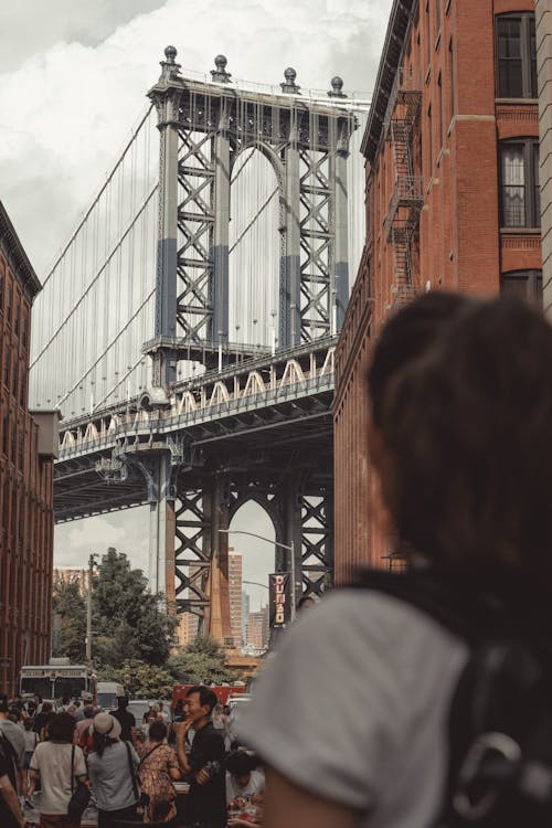 Pedestrians near the Manhattan Bridge seen from Dumbo, New York City, New York, USA