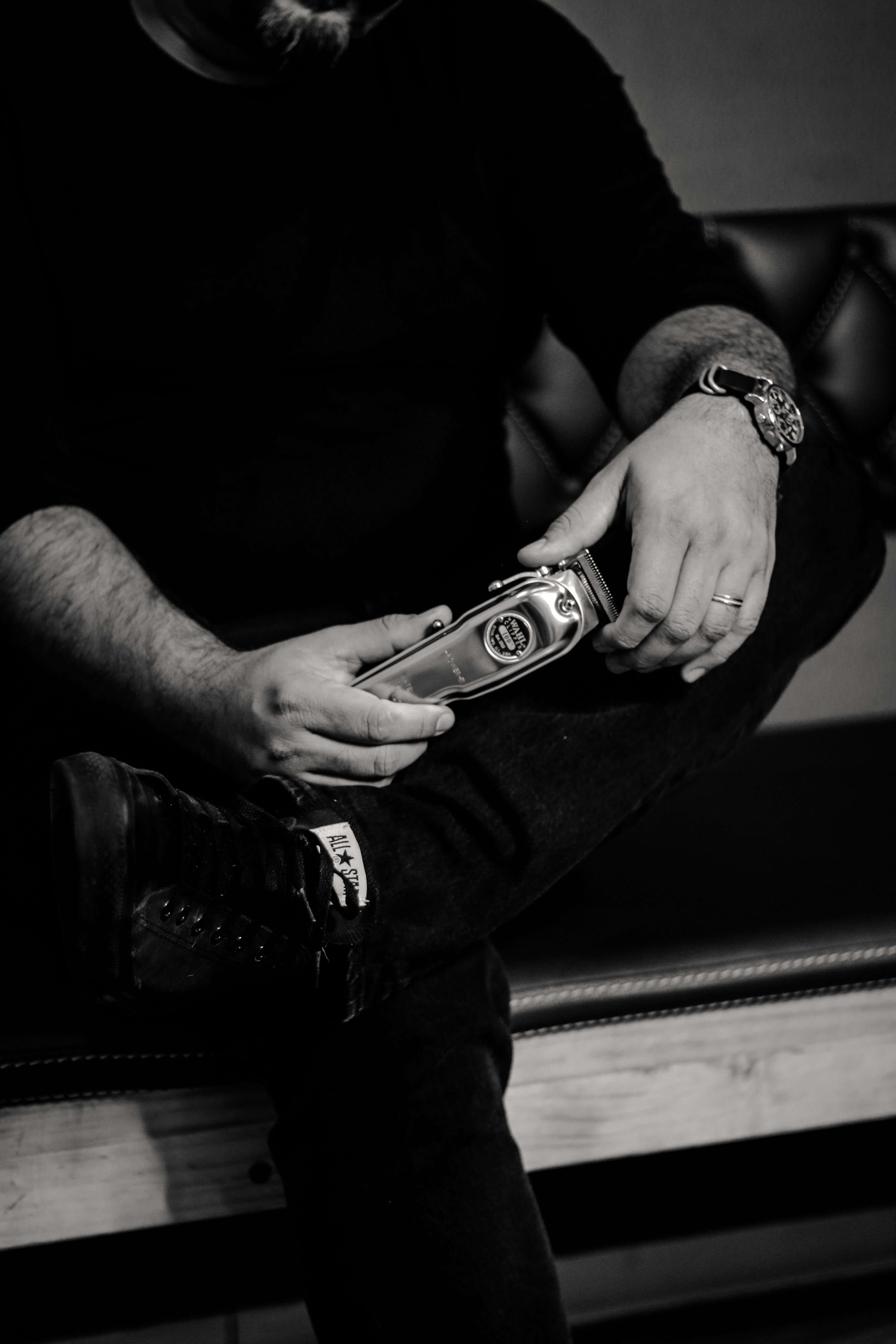 Man holding a cordless clipper