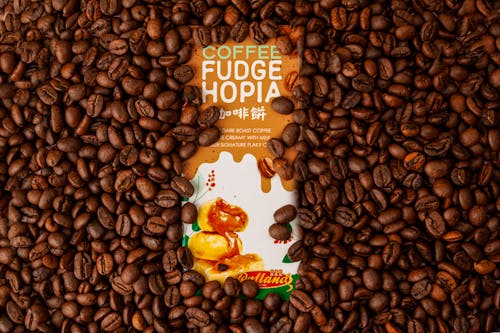 Pack of Fudge Pastries Lying in a Pile of Coffee Beans