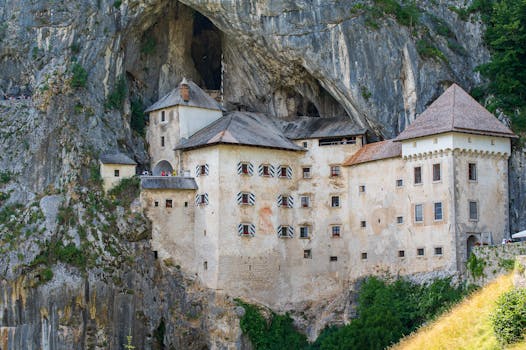 Explore the stunning Predjama Castle nestled in a cave in Slovenia, a symbol of medieval architecture.