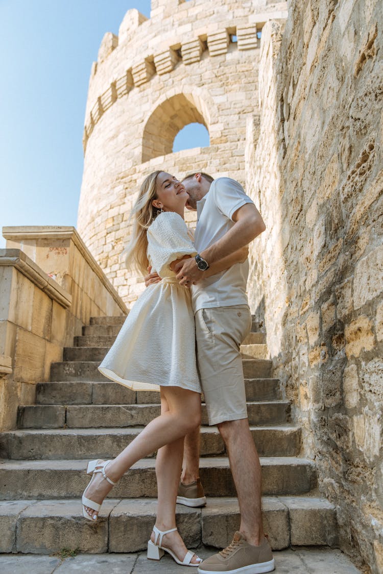 Couple In Front Of An Ancient Building