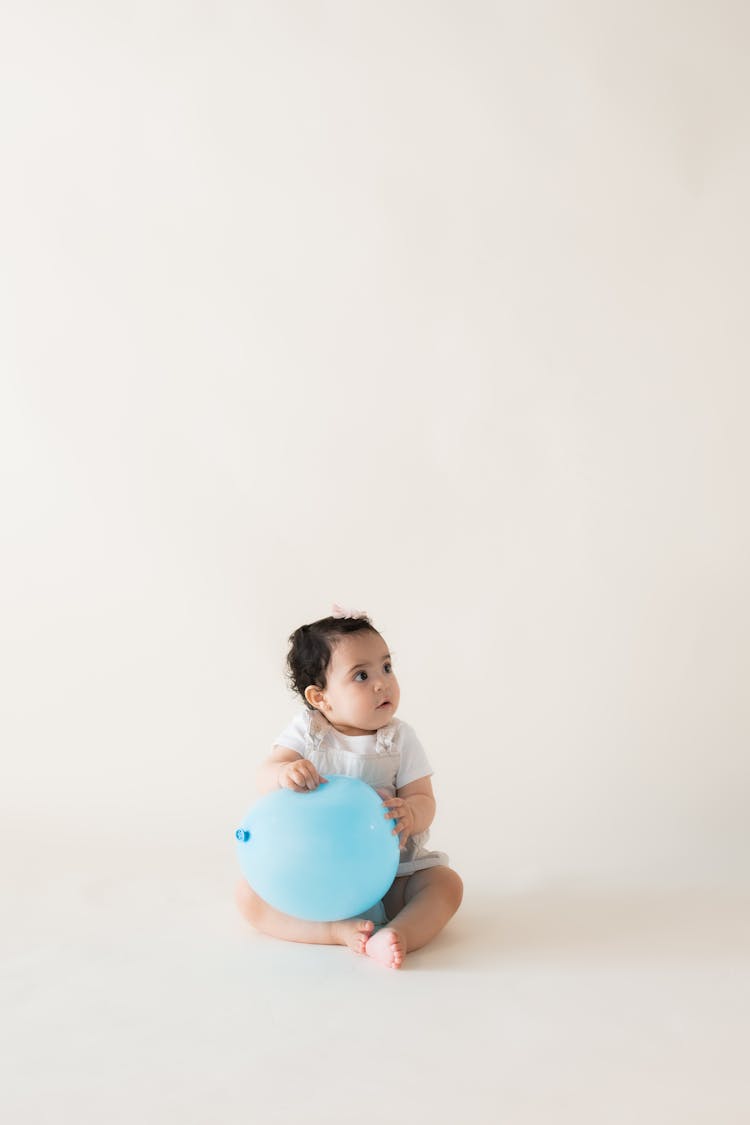 Little Baby With A Balloon