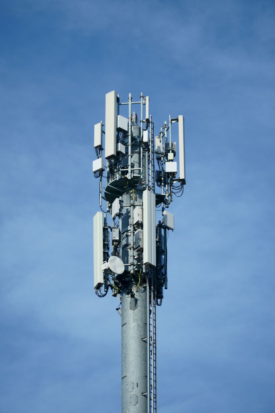 Cellular tower against blue sky