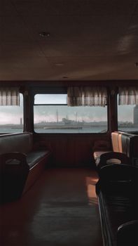 Serene view from a ferry overlooking İstanbul's skyline, capturing quiet travel moments.