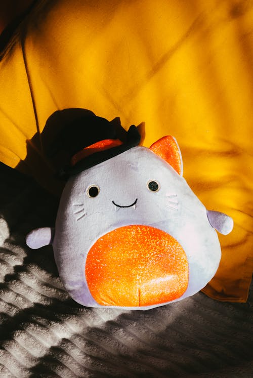 Free Cute Toy on Bed with Blanket Stock Photo