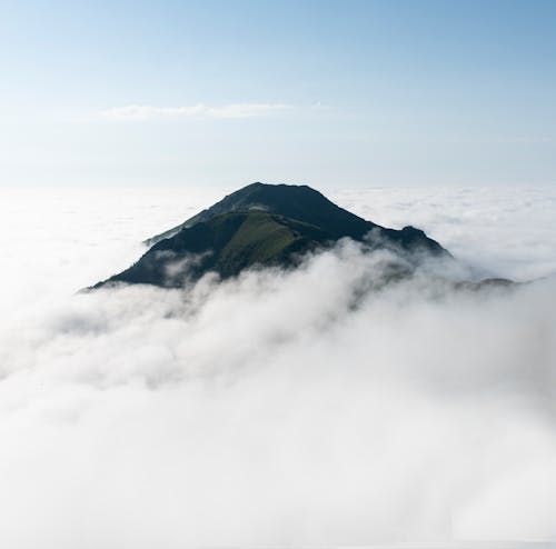A Mountain Peak above the Clouds