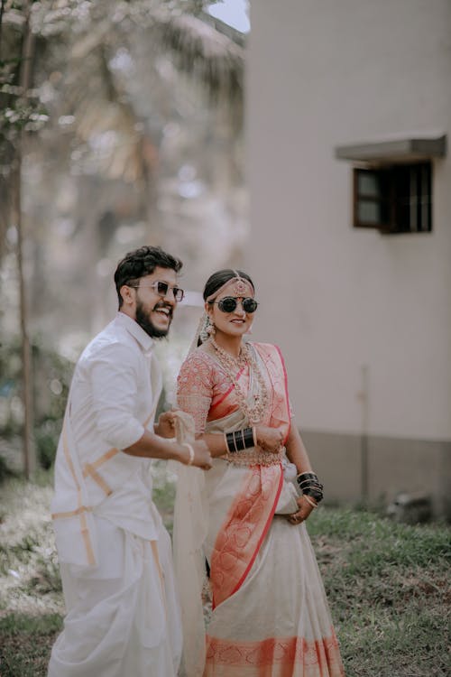 Smiling Couple in Traditional Clothing