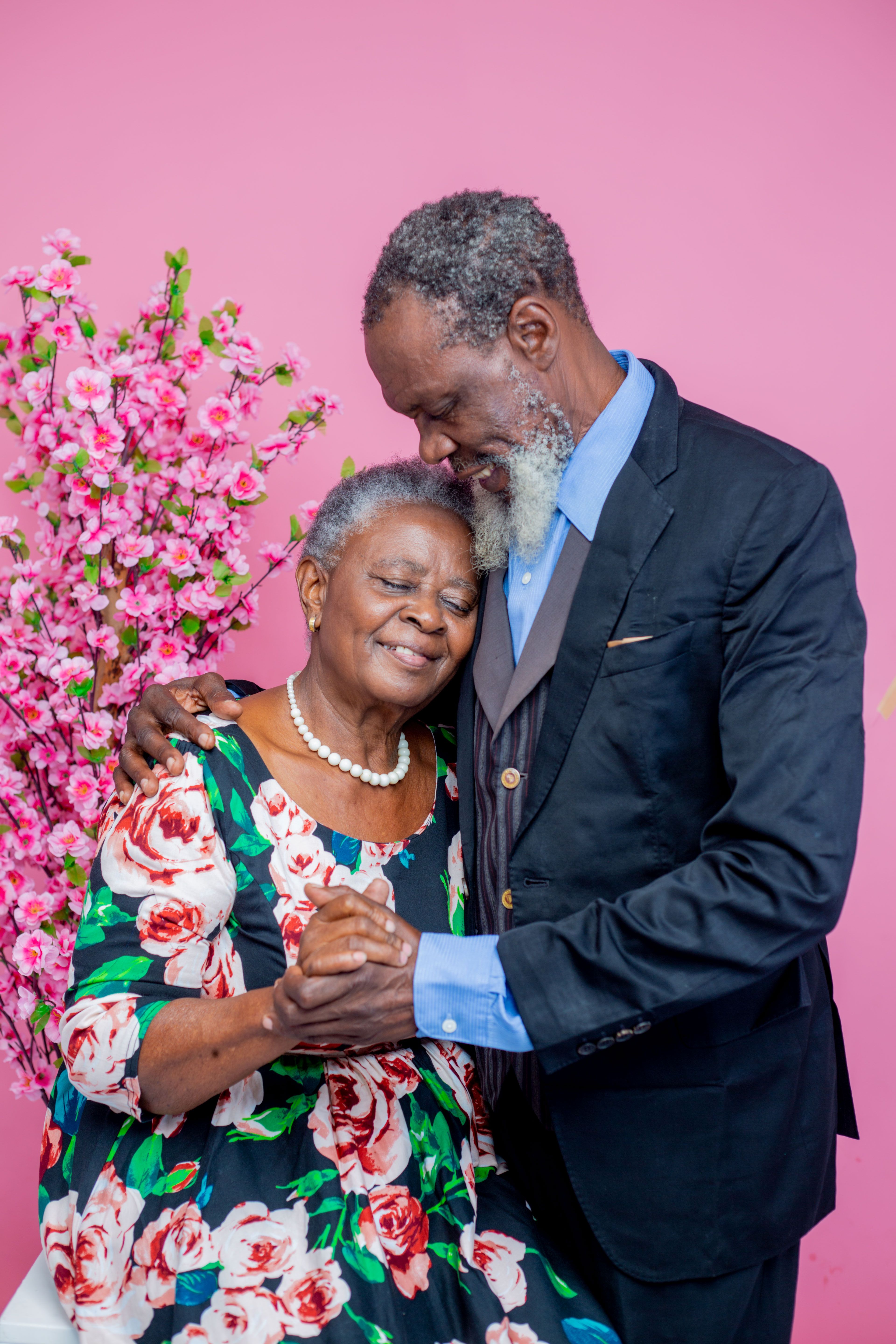 Elderly Man in Suit with Woman in Dress · Free Stock Photo