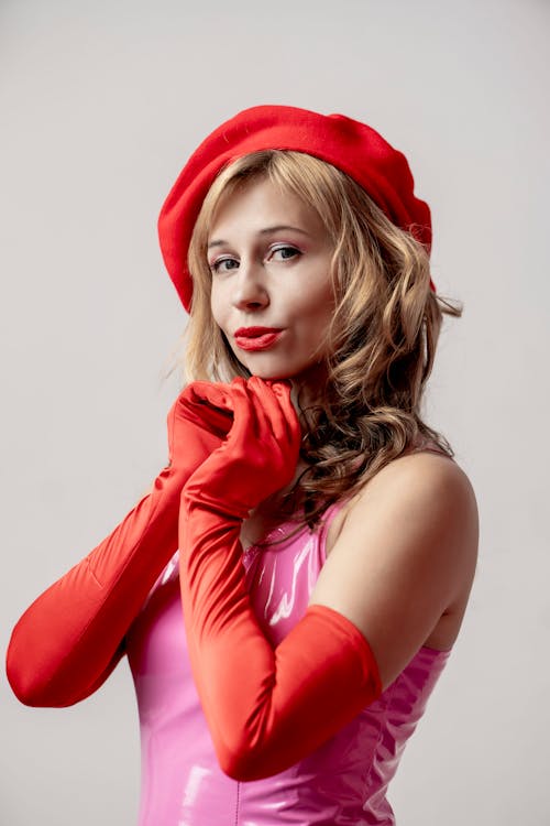 Woman in Hat and Red Gloves