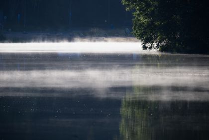 Mist drifting over still water at dawn — photo by Kimmo Vainio on Pexels