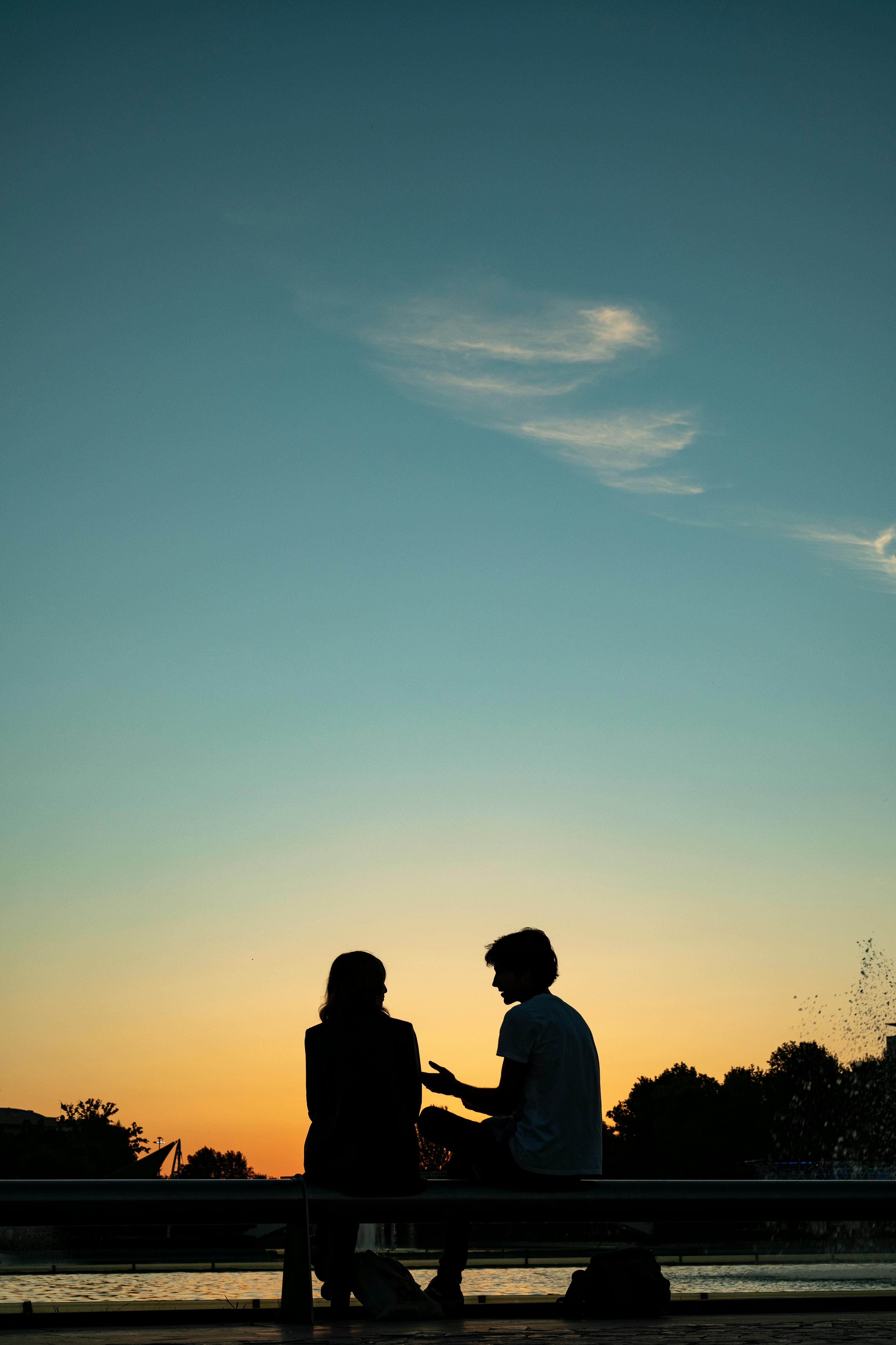 A Couple Sitting On The Bench · Free Stock Photo