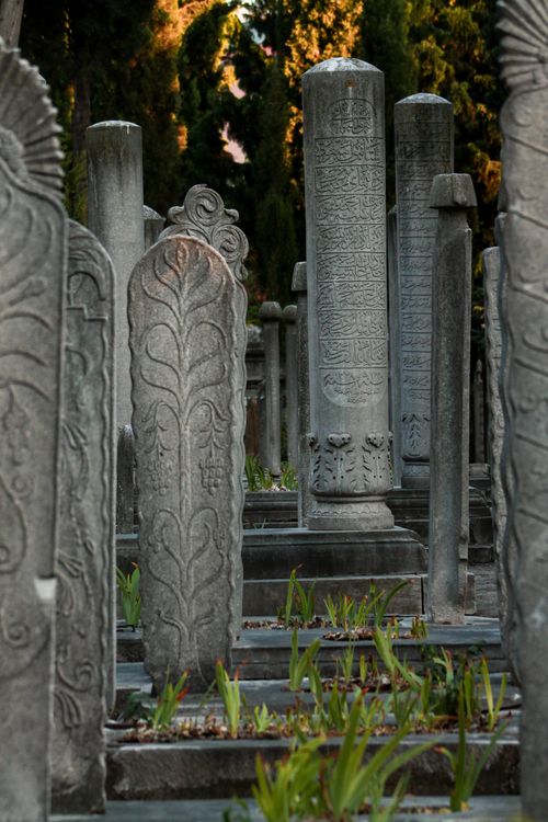 Free Historic gravestones in an Ottoman cemetery during twilight, reflecting cultural heritage. Stock Photo