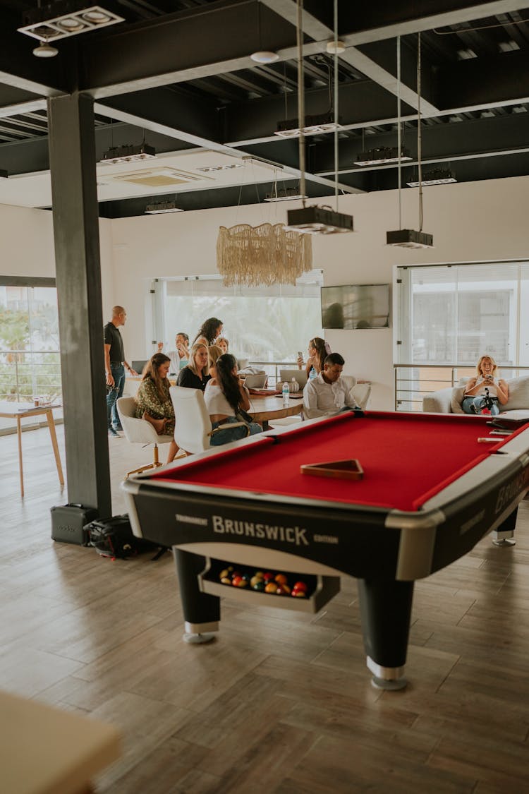 People Behind Billiard Table In Restaurant