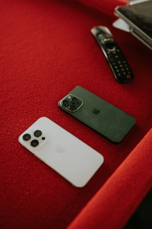 Smartphones on Red Flat Lay