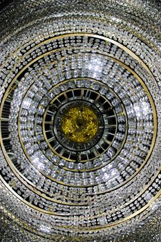 Stunning crystal chandelier featuring a mesmerizing circular pattern for luxurious interiors.