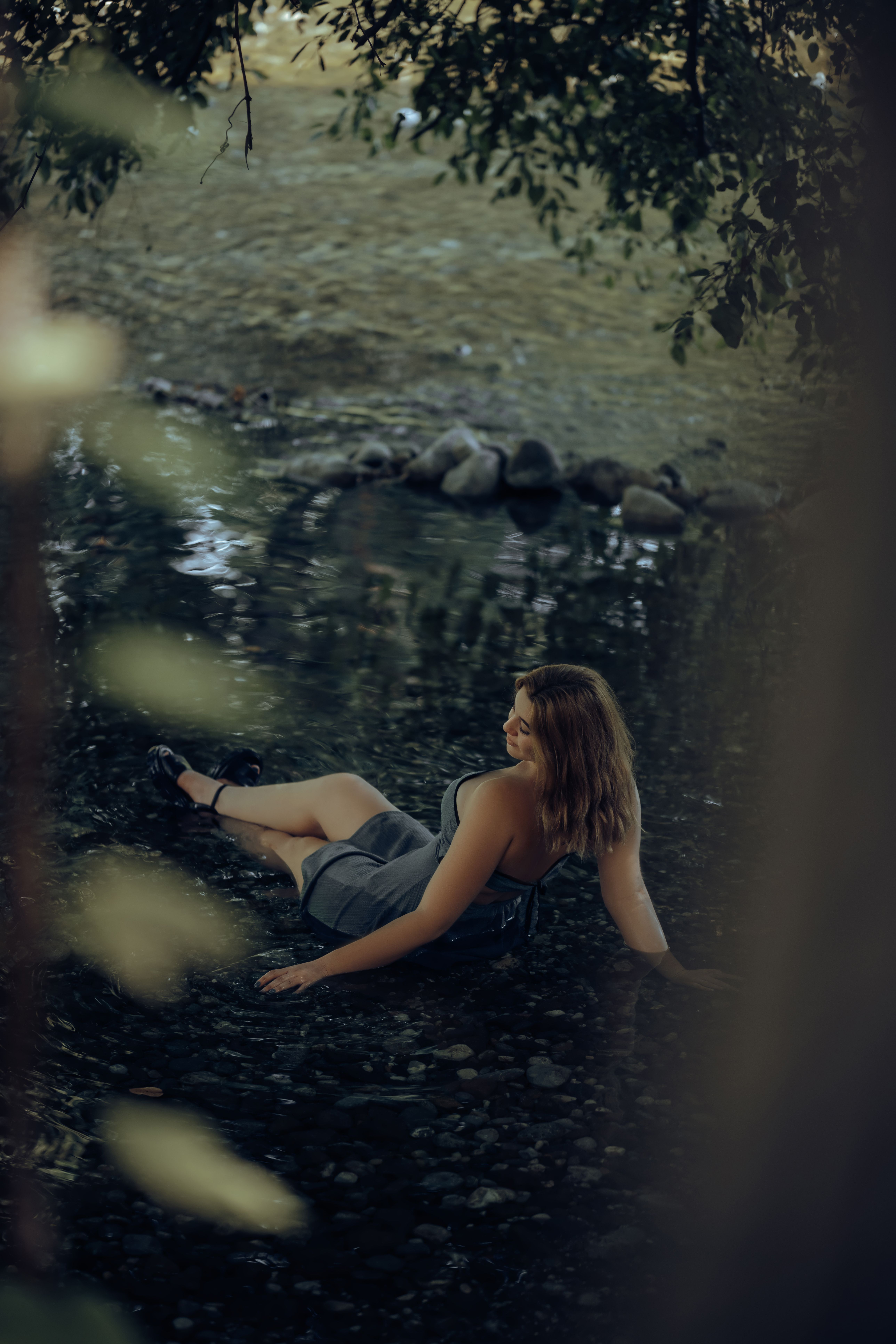 A Woman Sitting in Water · Free Stock Photo